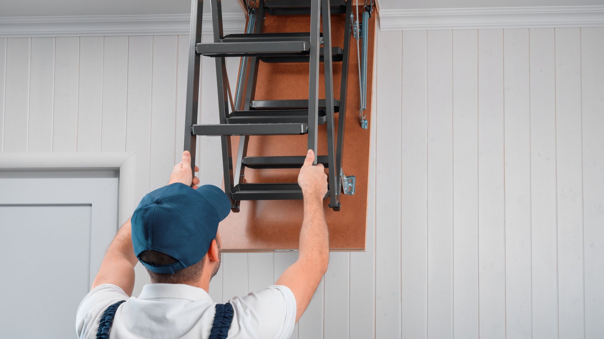 Sliding loft ladder